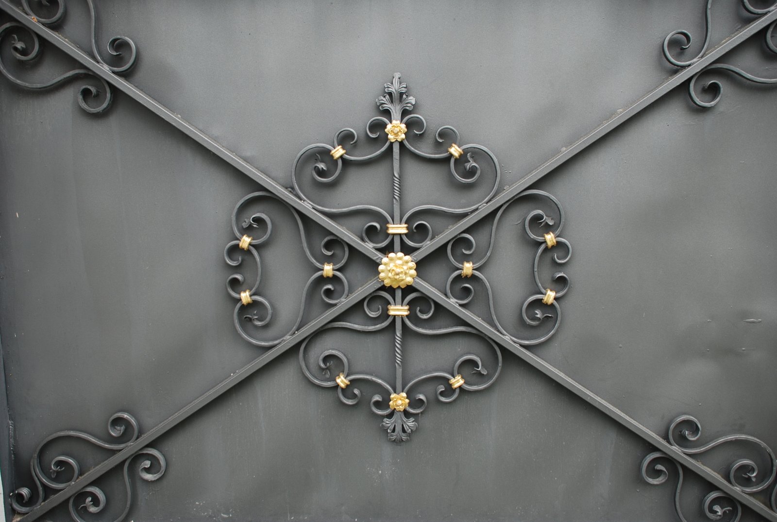 a decorative iron and gold plate decoration