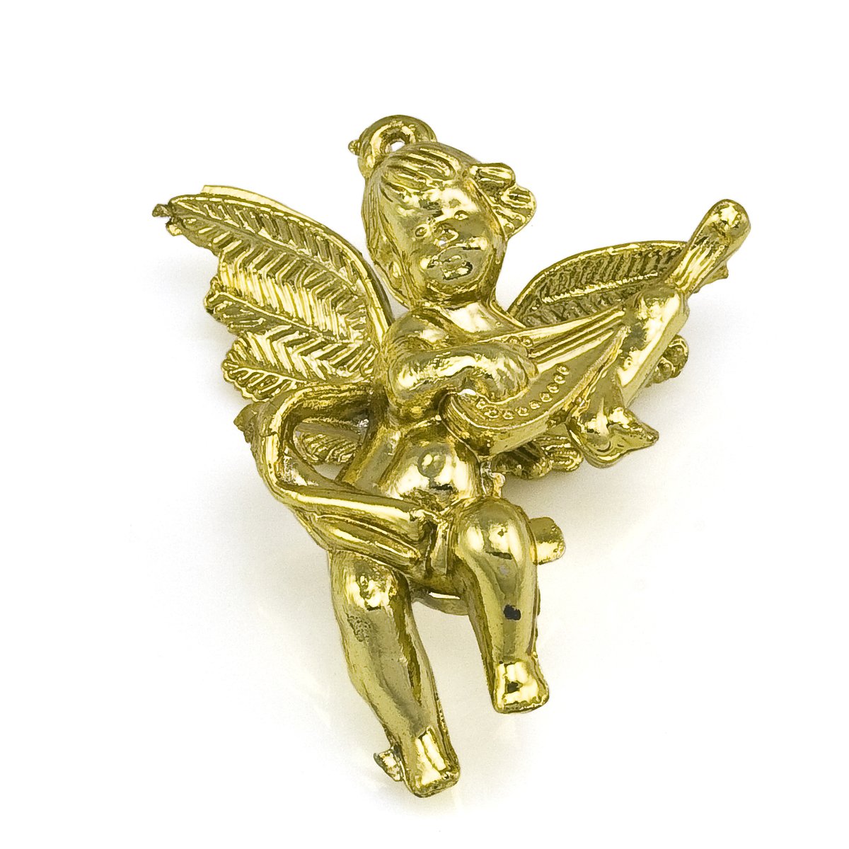 gold colored angel broochle sitting on a white surface