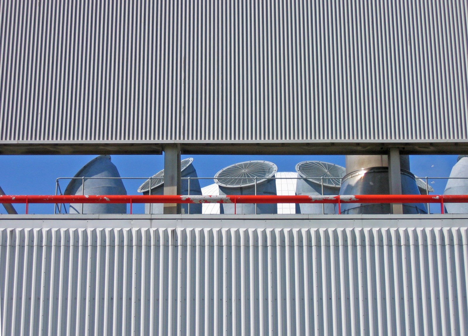 a window with some metal structures behind it