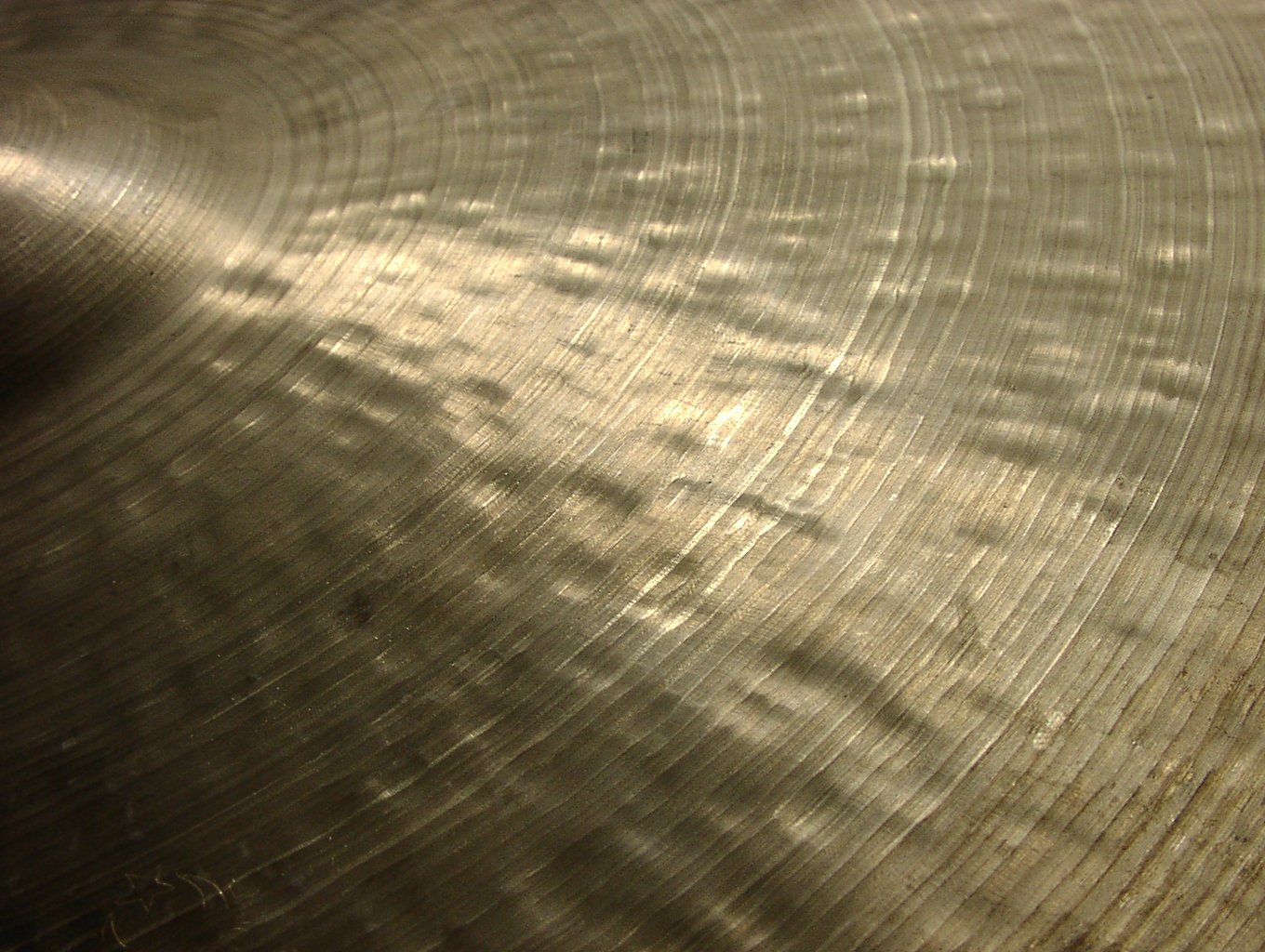 a large metal texture with small white clouds