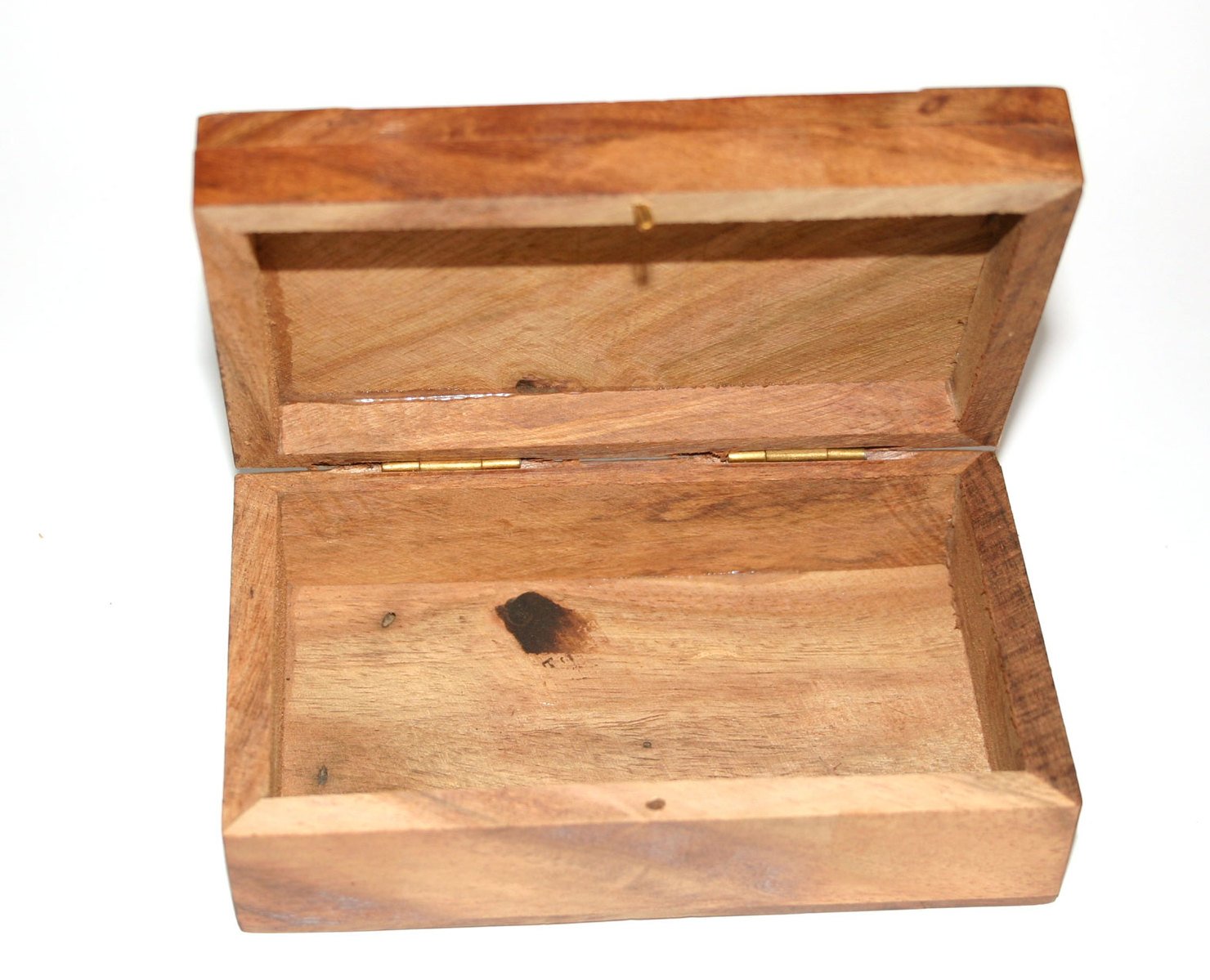 a wood box with lid open and some other parts inside