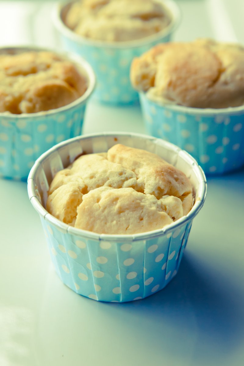 a close up of several small blue cups with food inside