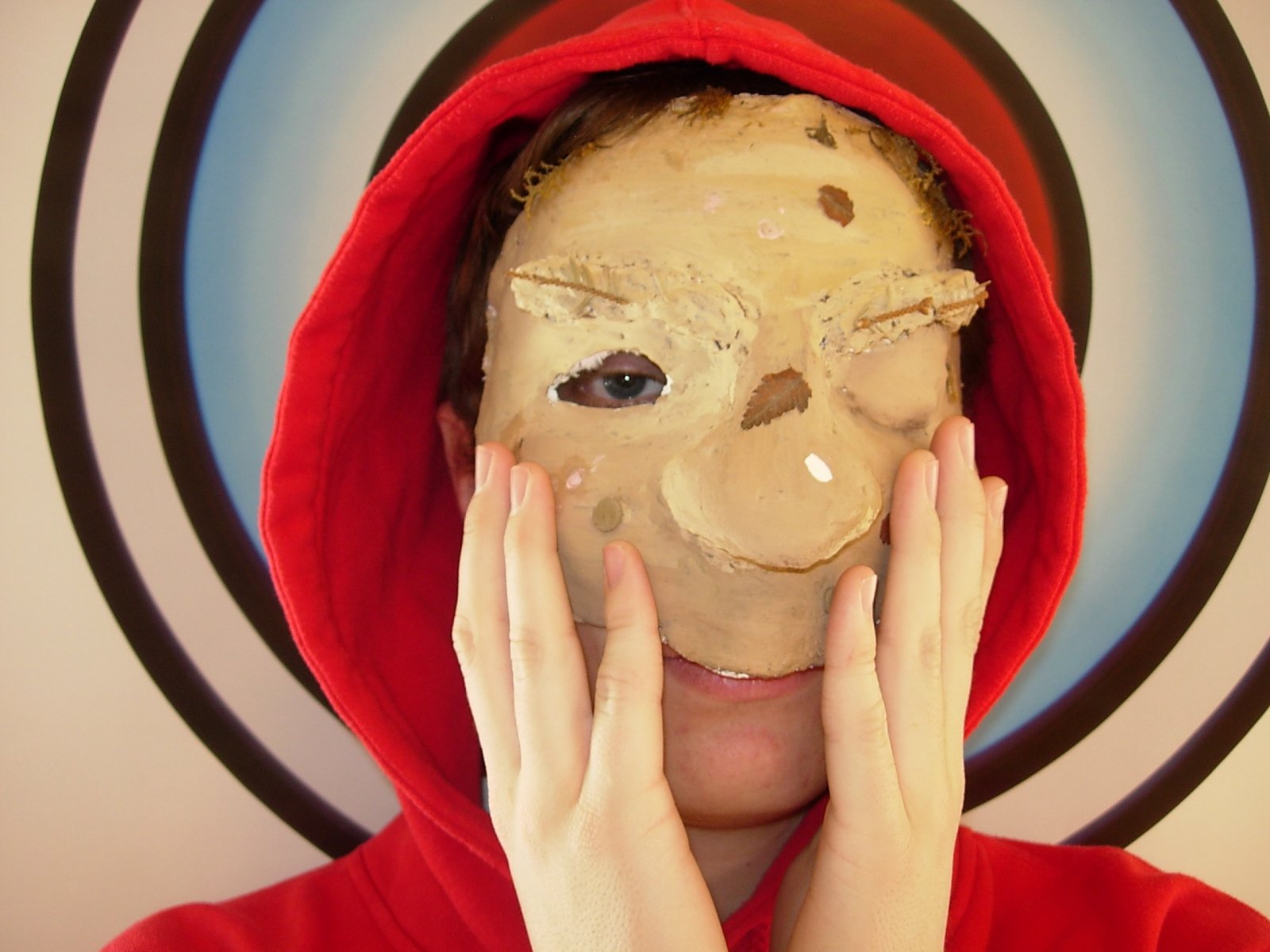 a person wearing a mask covering their face