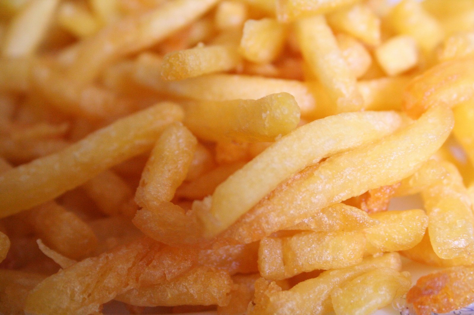 closeup of the seasoned fries have been eaten