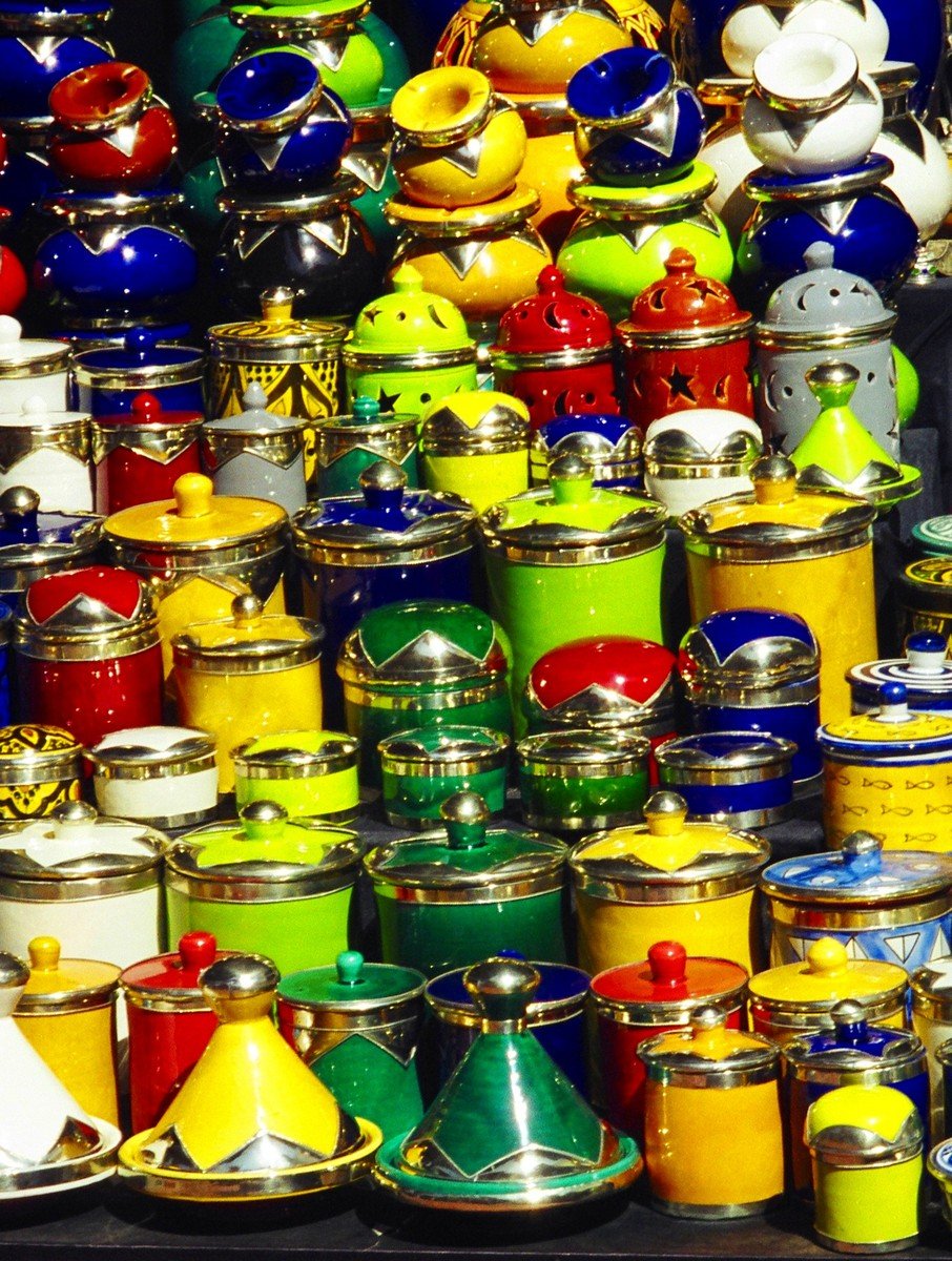 several jars that have some colored ones in them