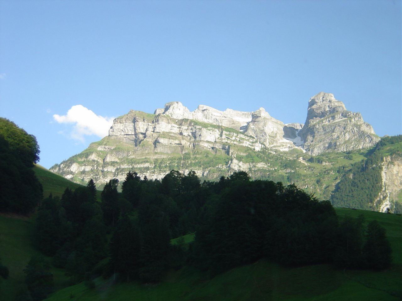 a mountain is visible in the distance