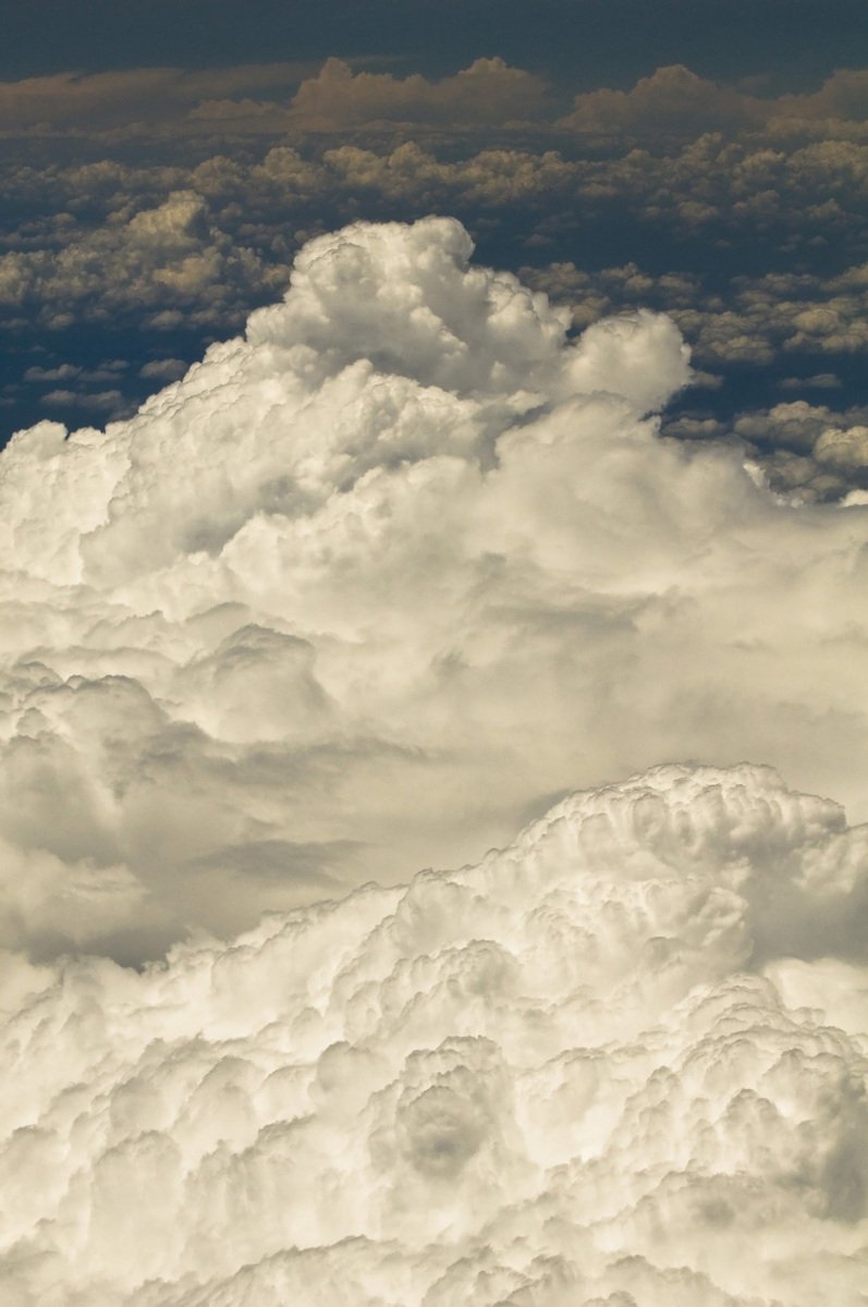 clouds are seen from above in the sky