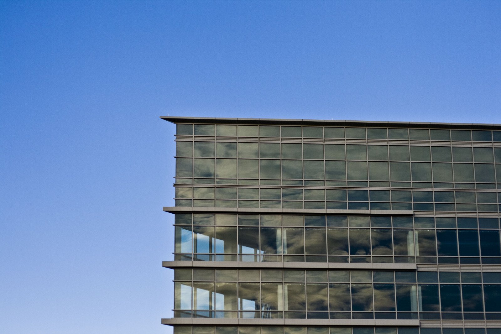 an airplane flies by on a clear day