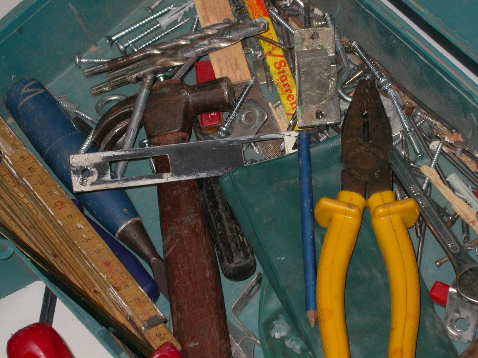 an open tool box filled with tools for a man