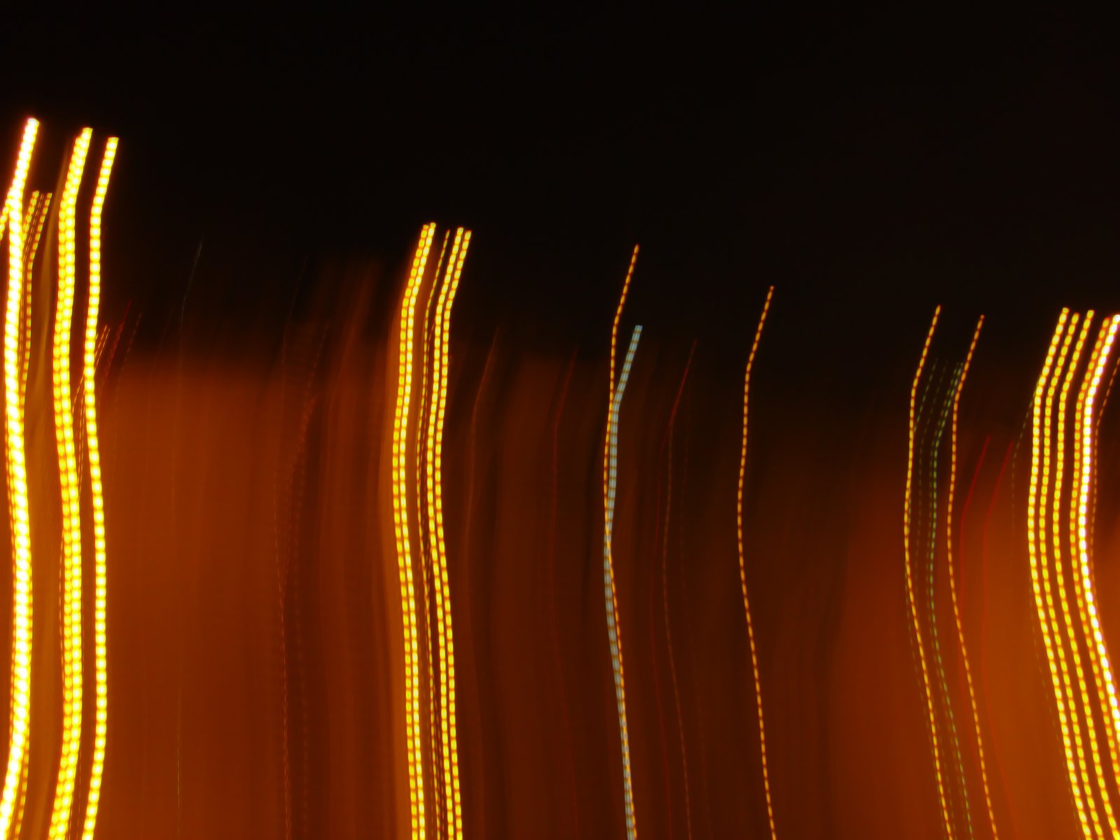 blurred streaks and lights in a dark room