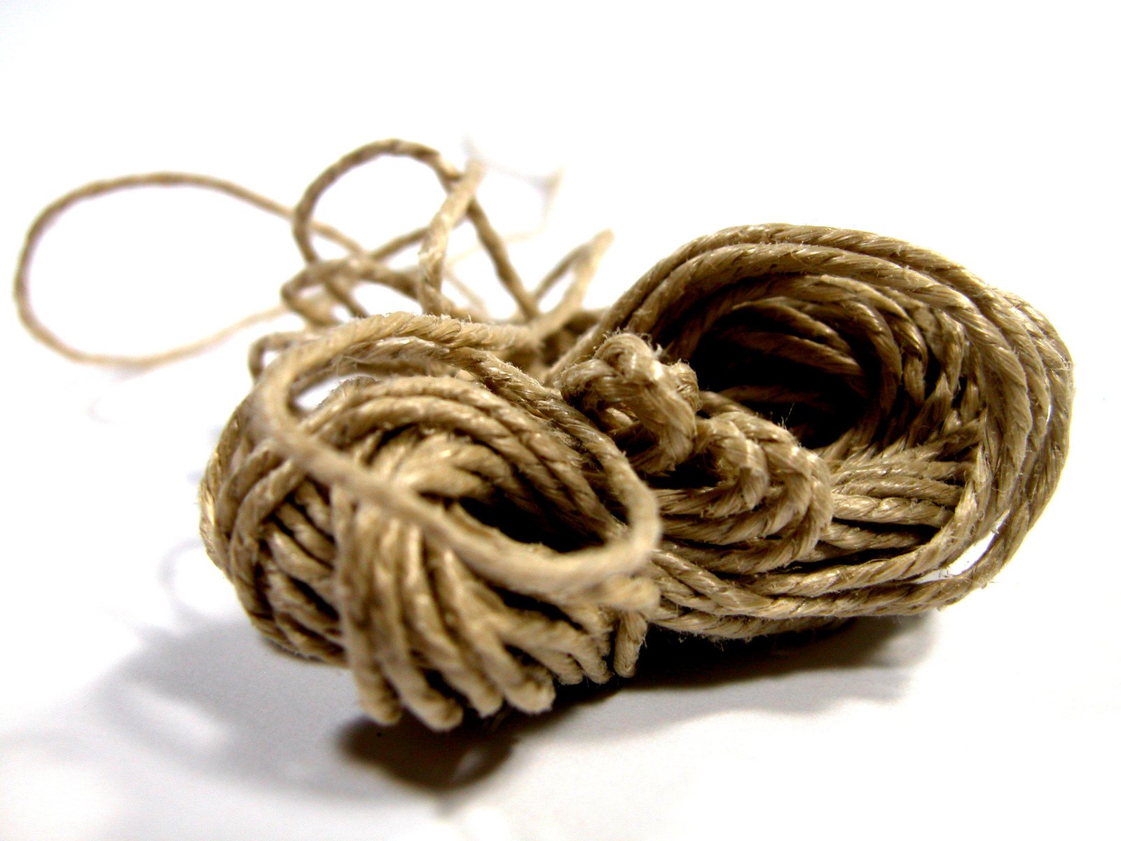 a brown piece of rope with several strands of twisted