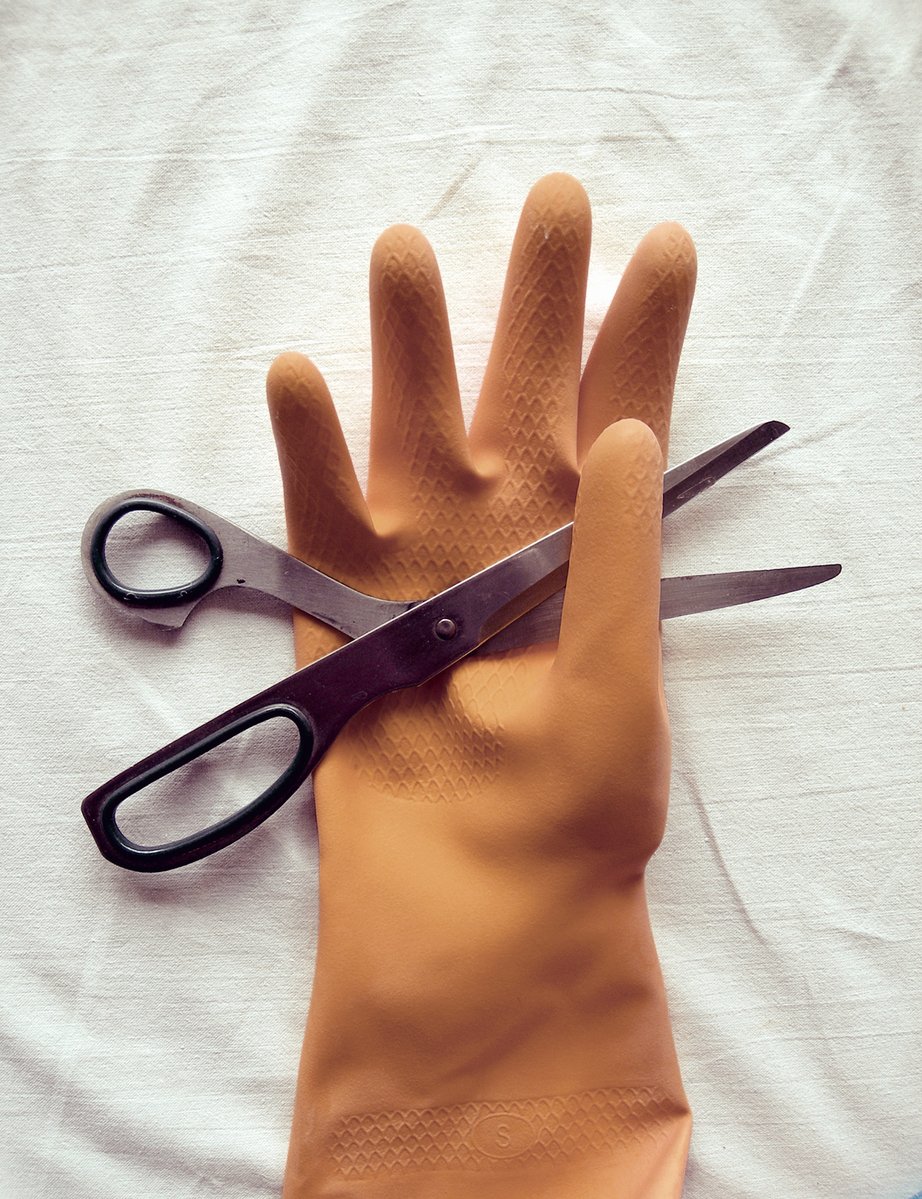 a pair of gloves and a pair of scissors