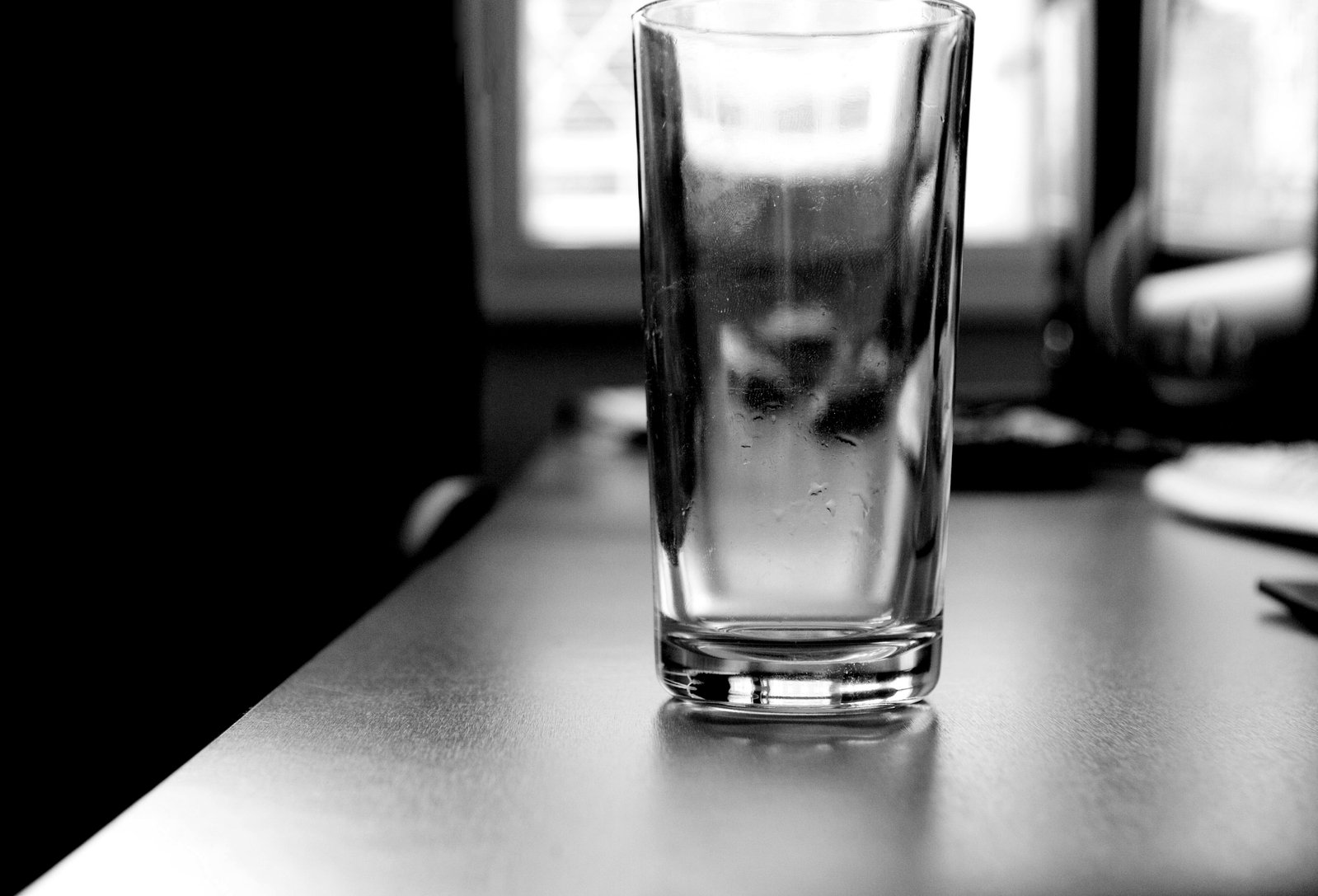 a glass sitting on top of a table