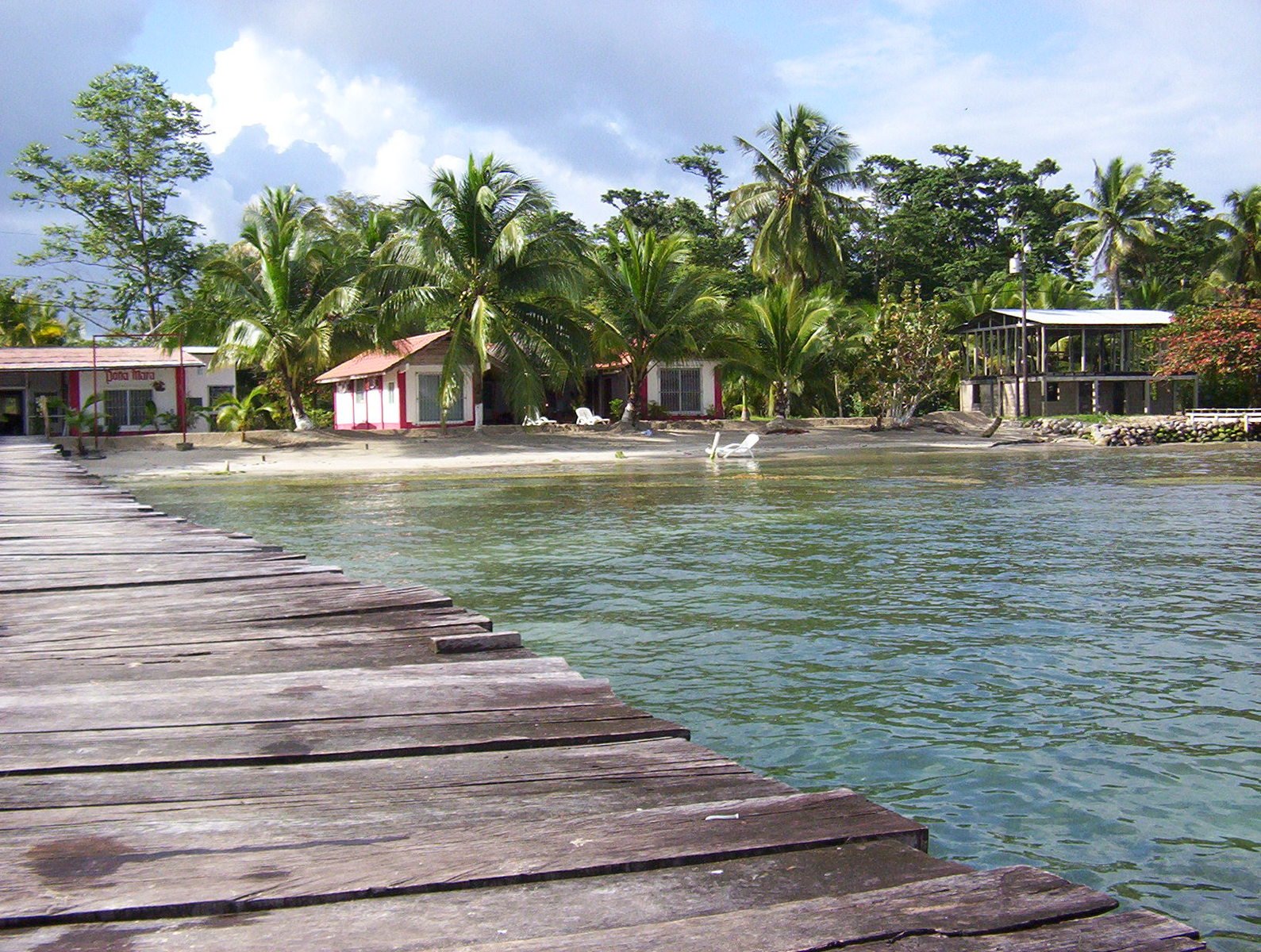 a long wooden dock across the water