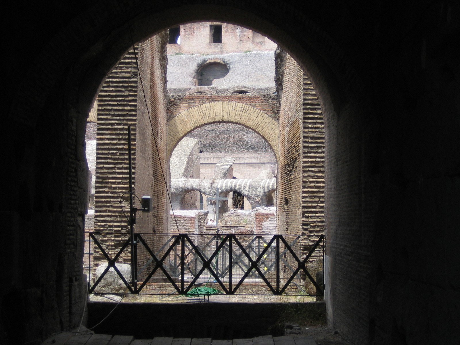 an entrance into a tunnel, in which the view is from inside and out