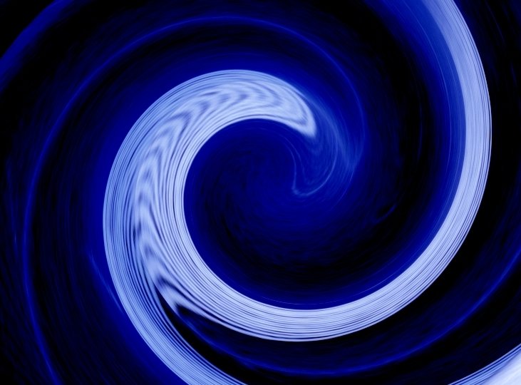 a blue circular painting is shown in a swirl pattern