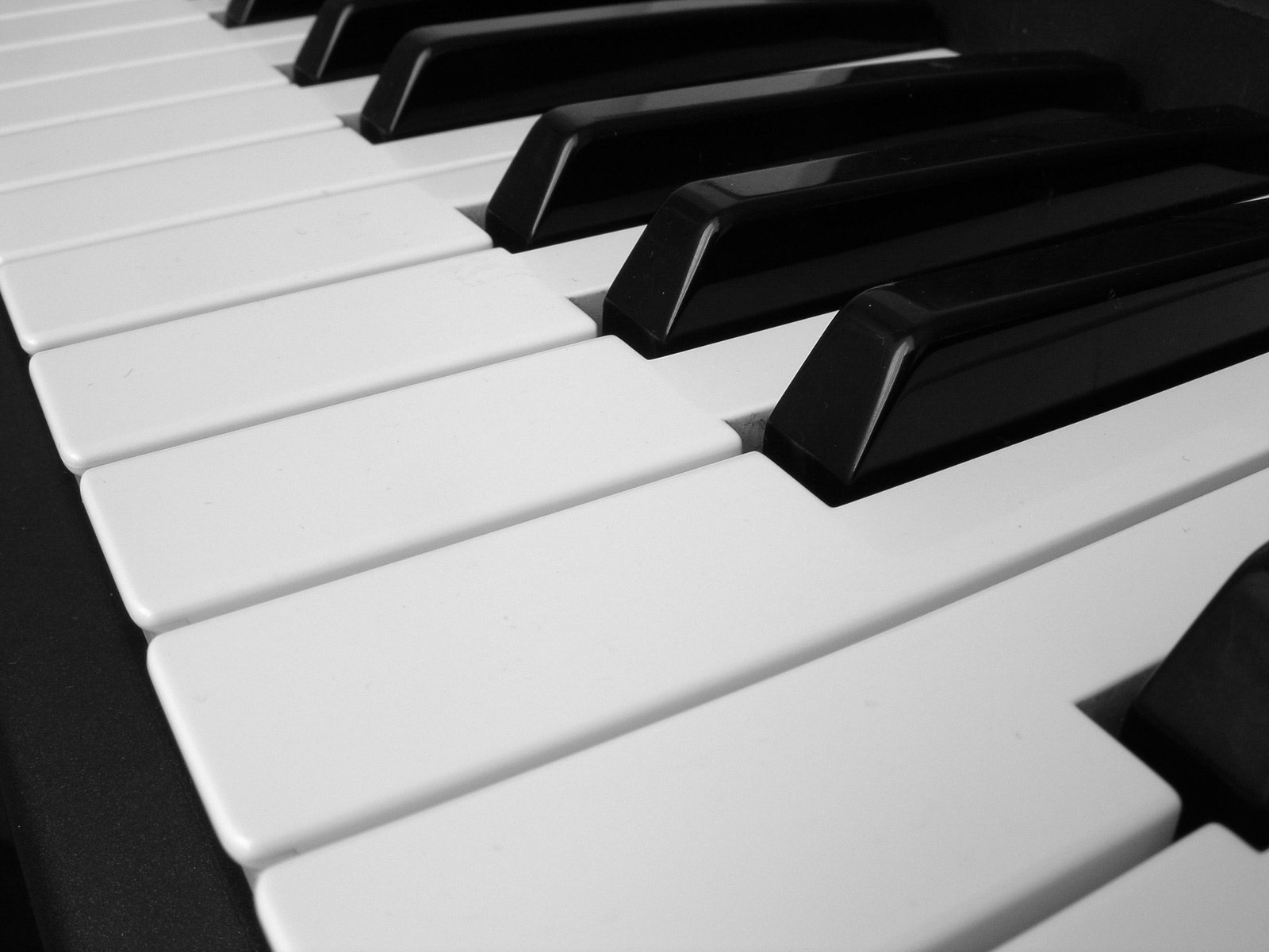 a piano is shown with black keys