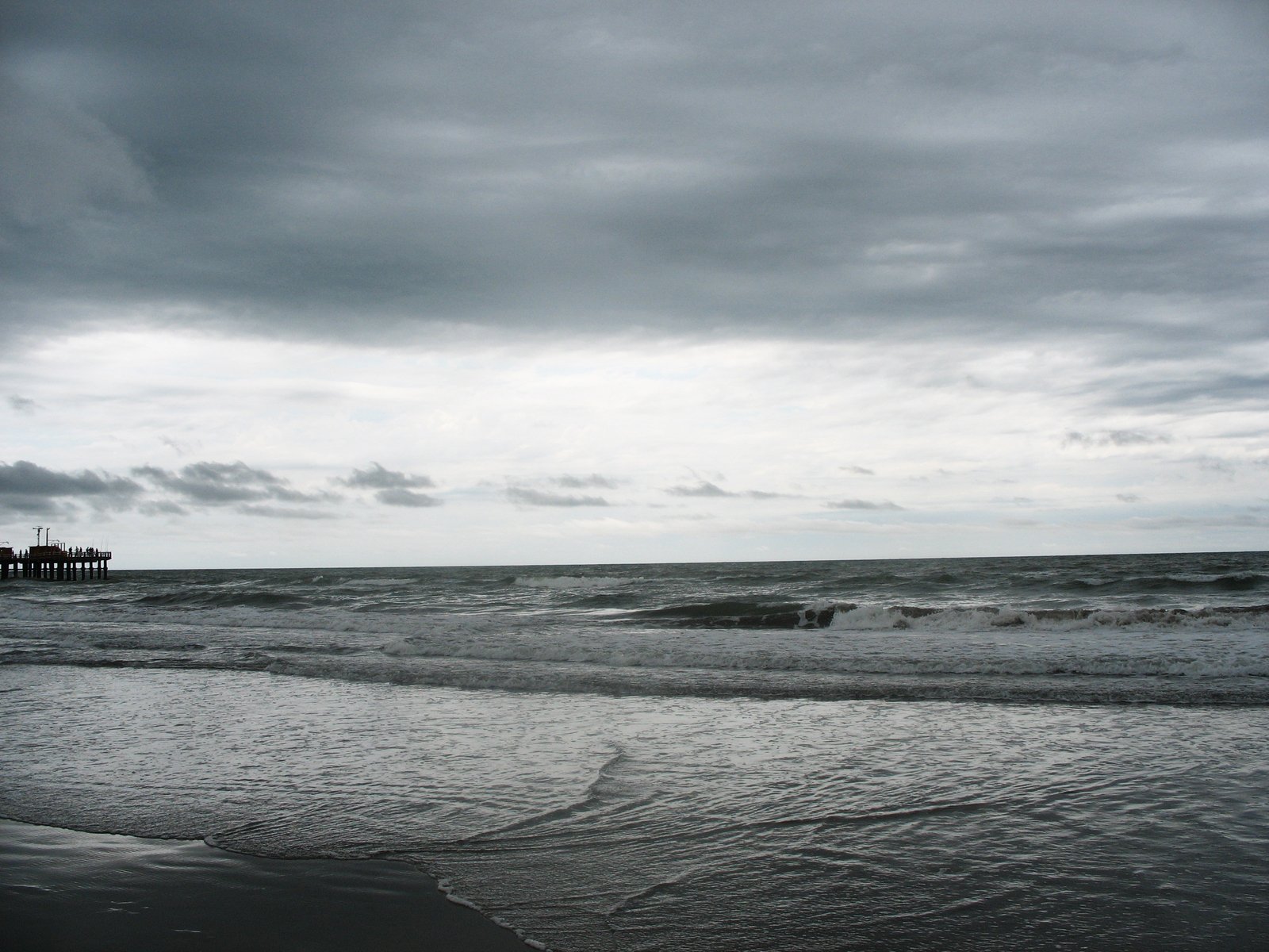 a picture of a beautiful beach taken from the sand