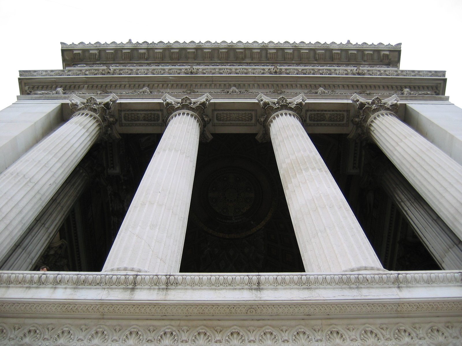 four pillars surrounding the center part of the building