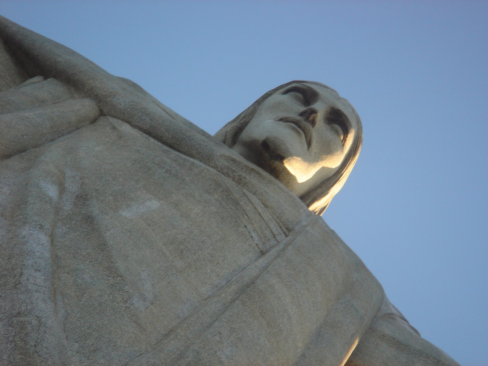 a statue that is looking up into the sky