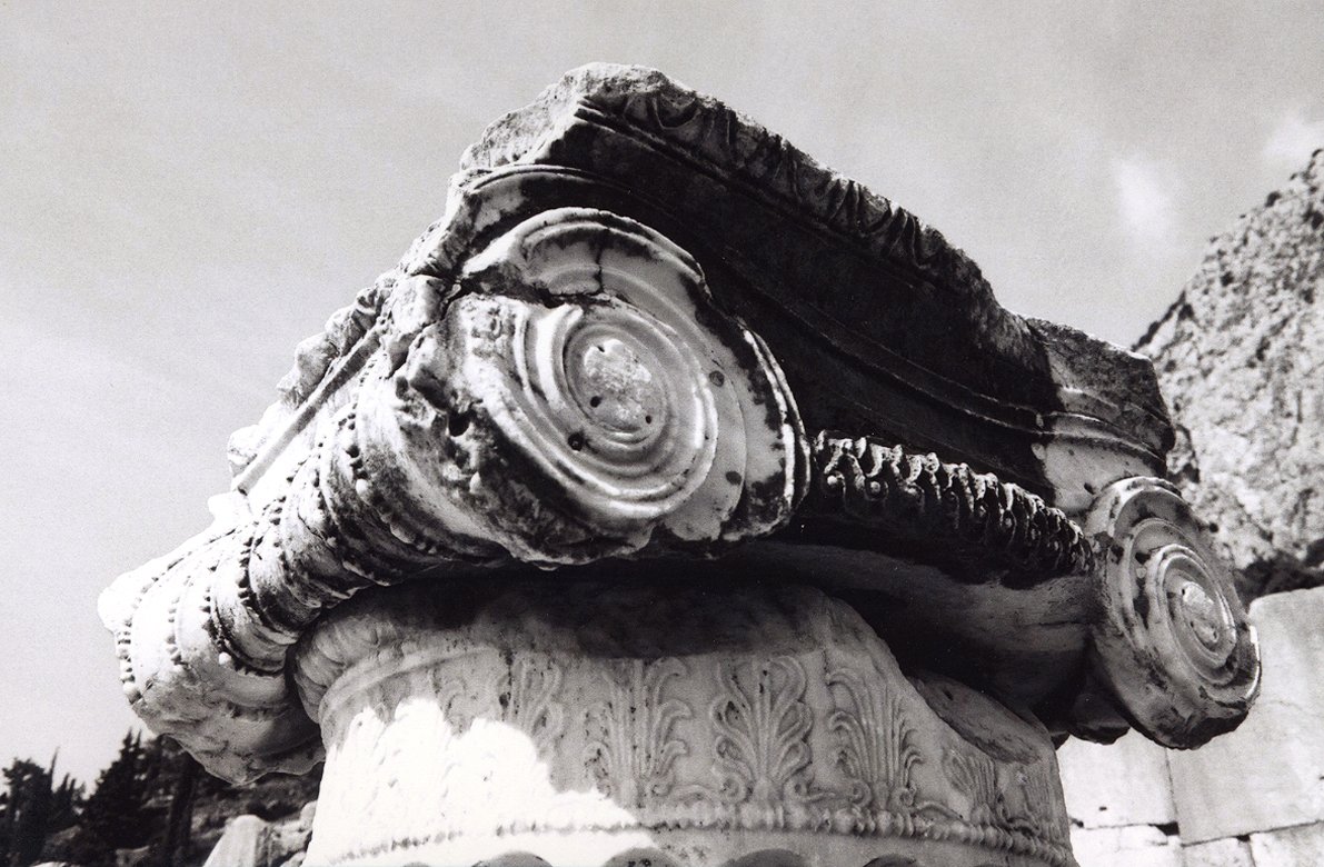 ornate decoration on the top of an old building