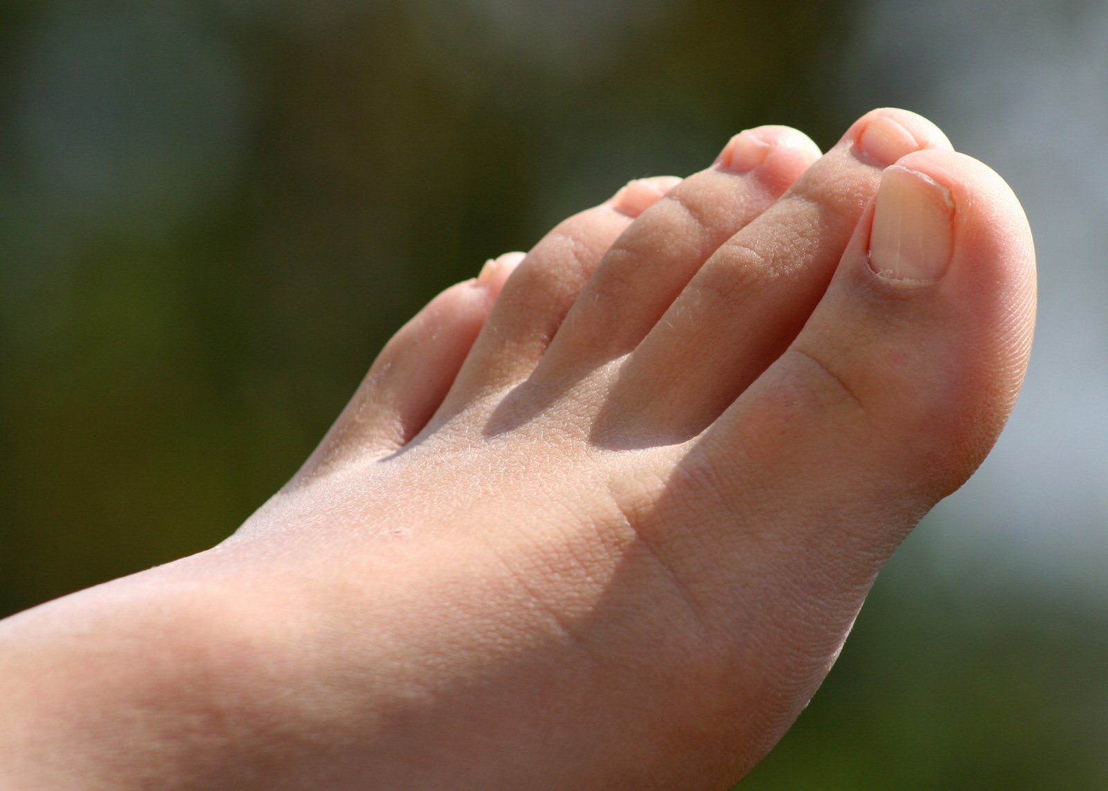 the foot and toes of a baby are shown in close up view