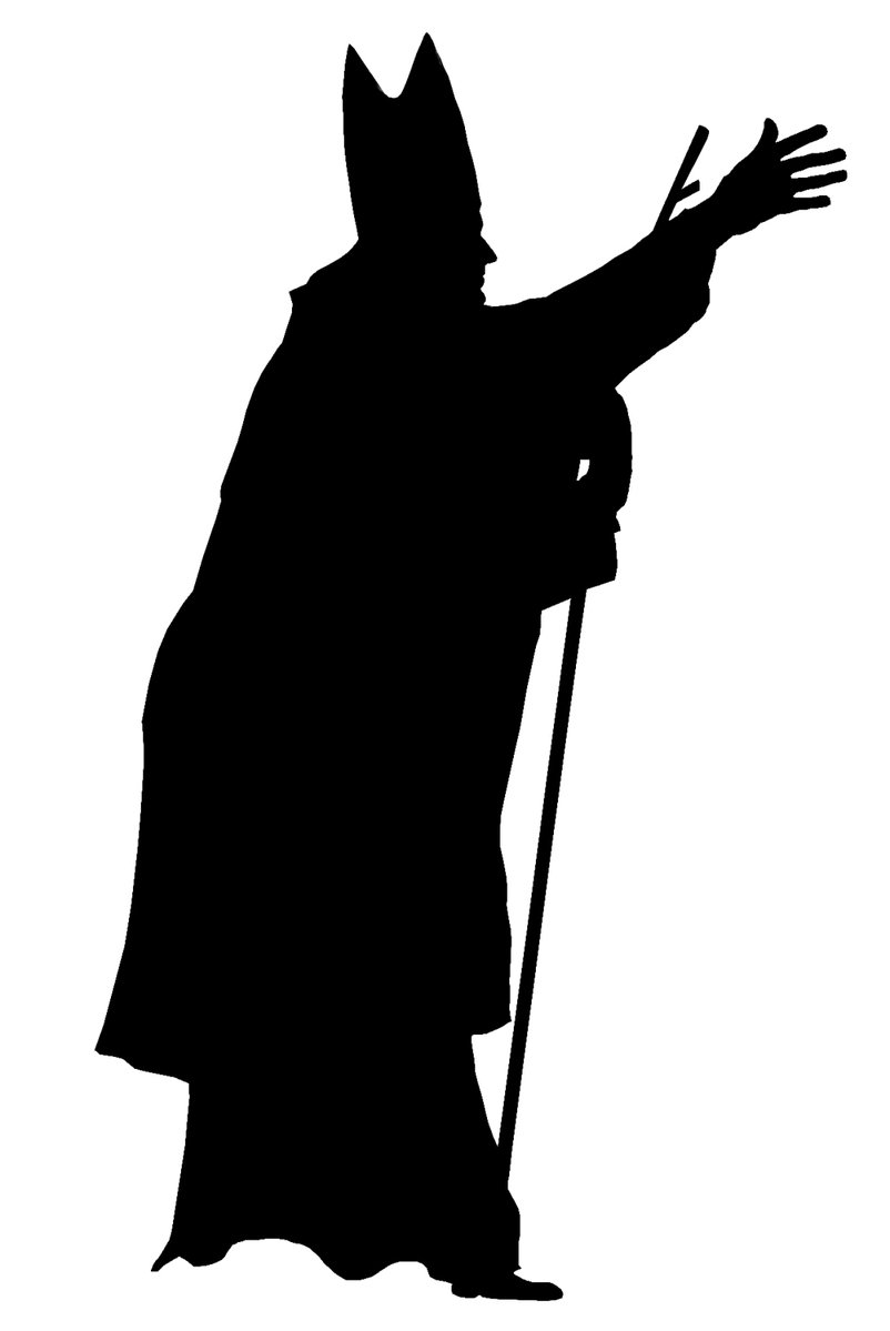 the silhouette of a man dressed in a wizard's hat and cloak