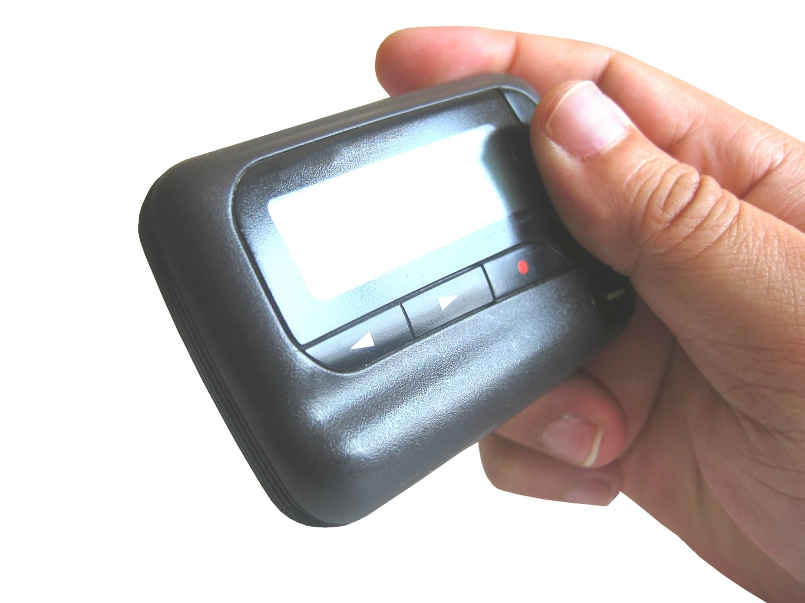 a hand holding onto a small black device