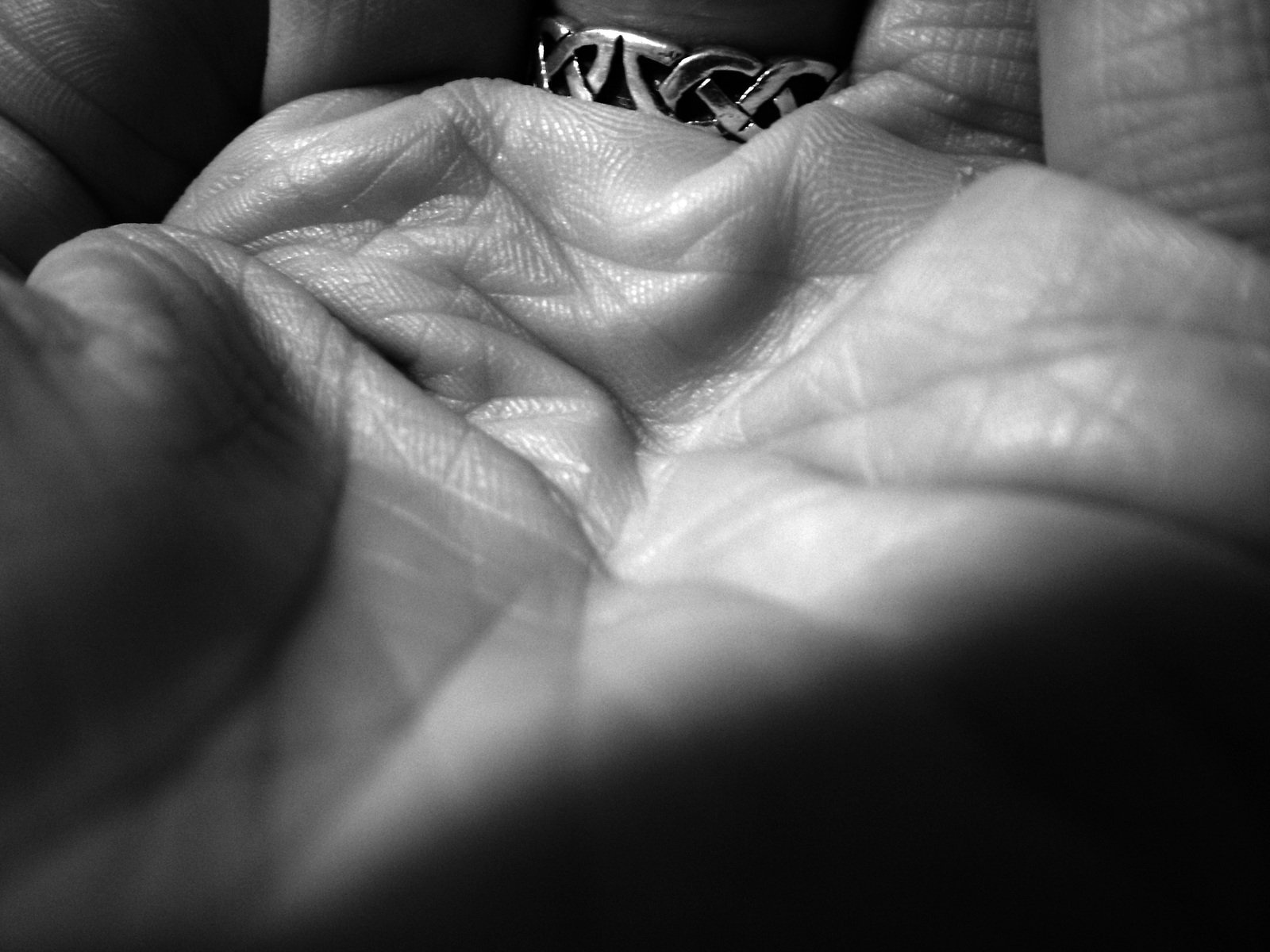 a black and white po of a baby's ring