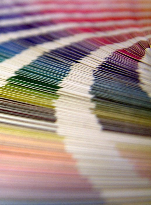 a close up of some very colorful papers