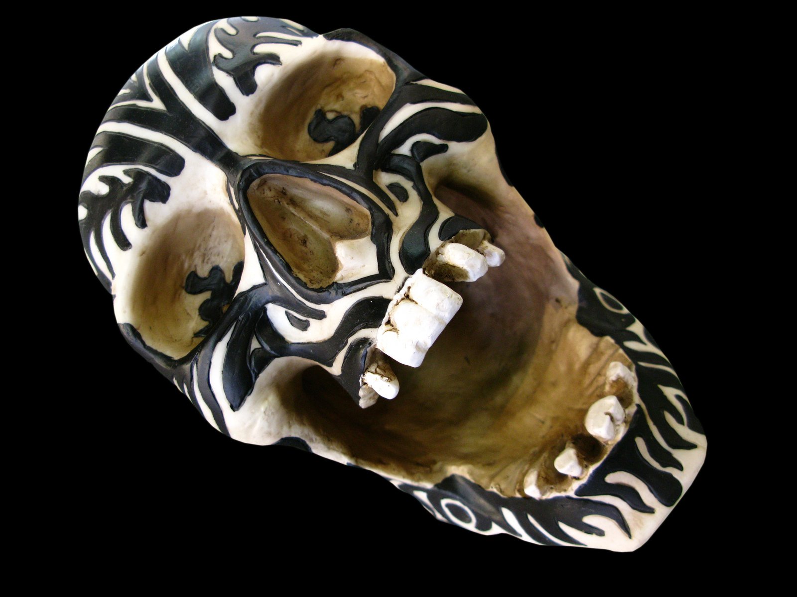 a mask with an unusual design and ornate decorations