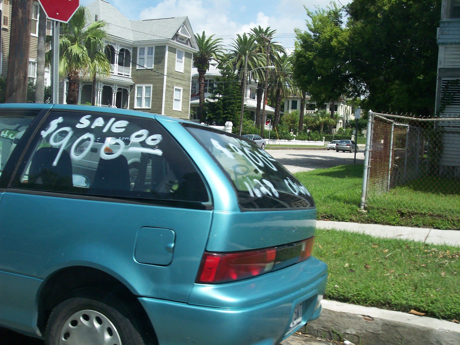 the side view of a car covered in graffiti