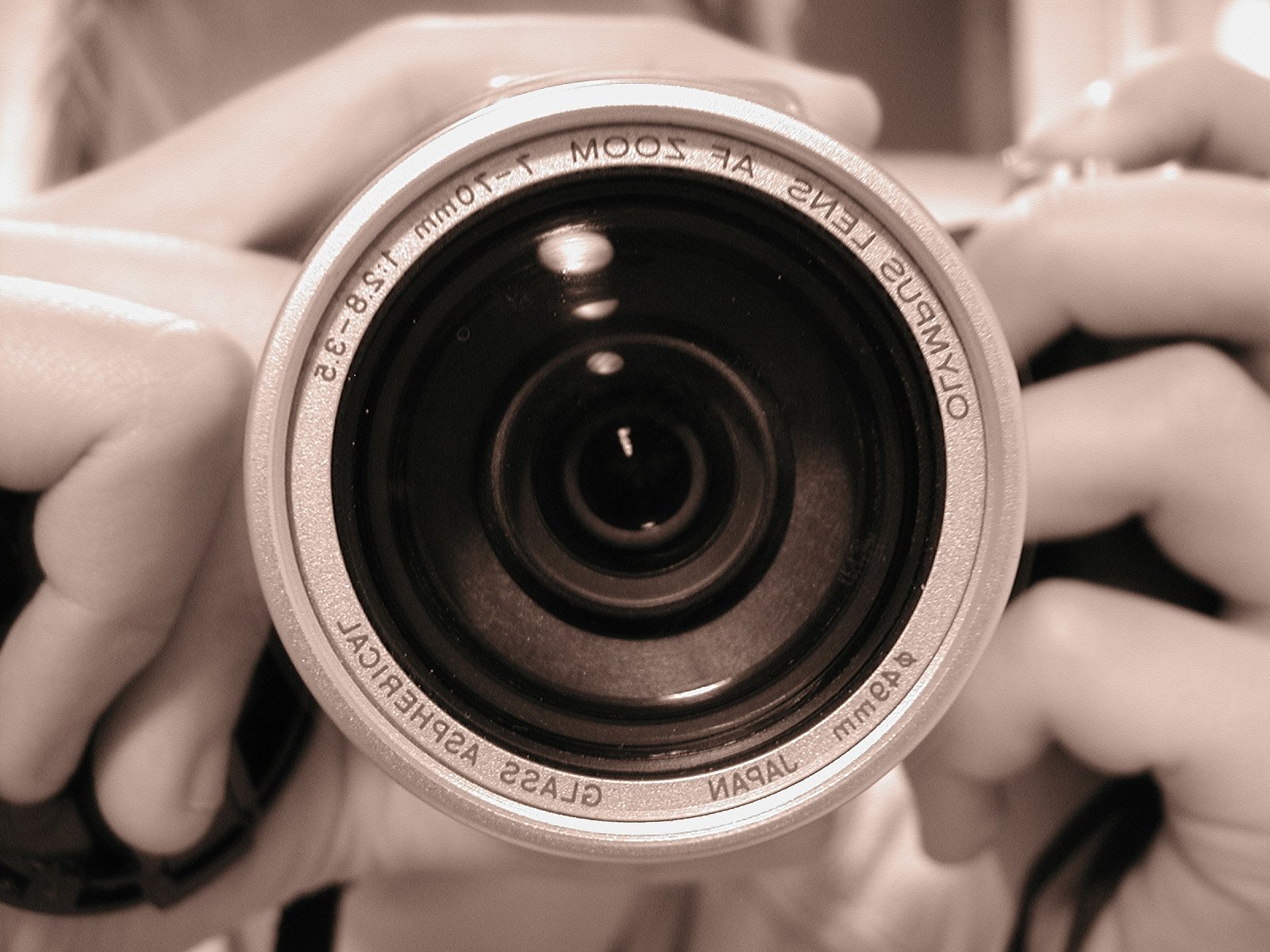 an image of a pographer holding his camera