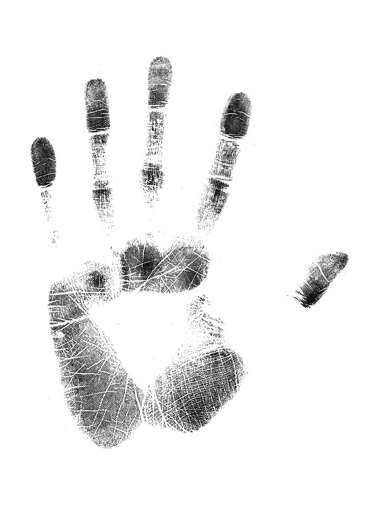 a black and white hand and footprints