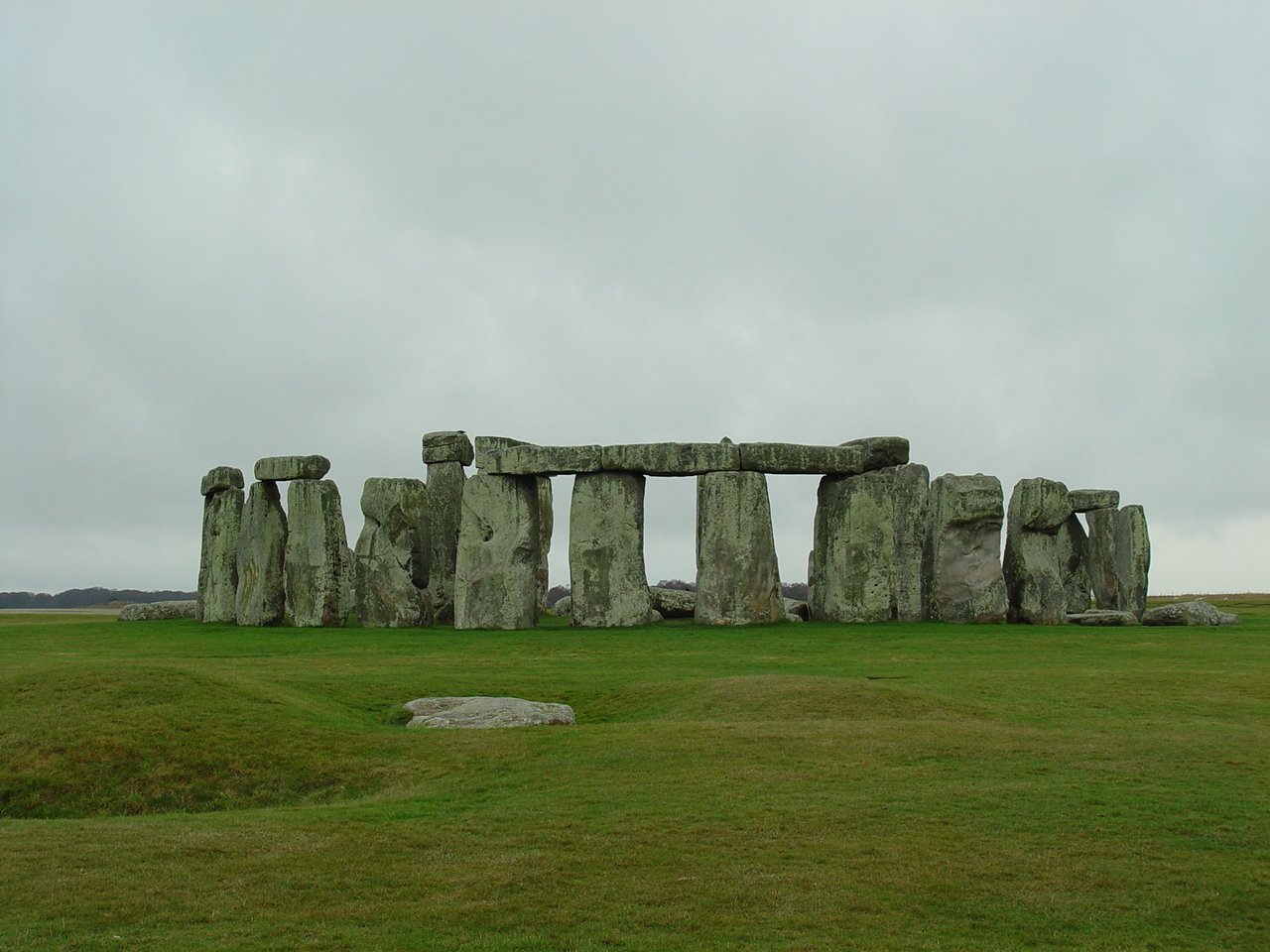 the stonehenge is on display in a vast field