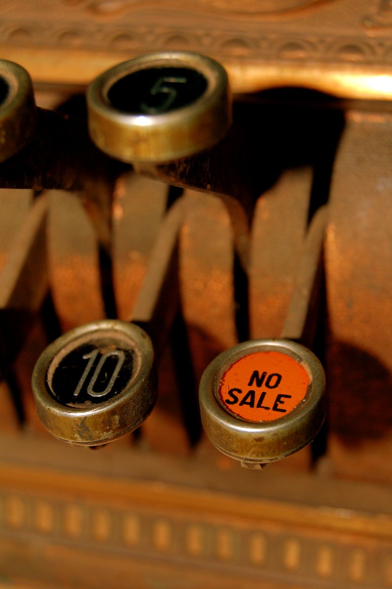 a collection of s are sitting on an antique piano