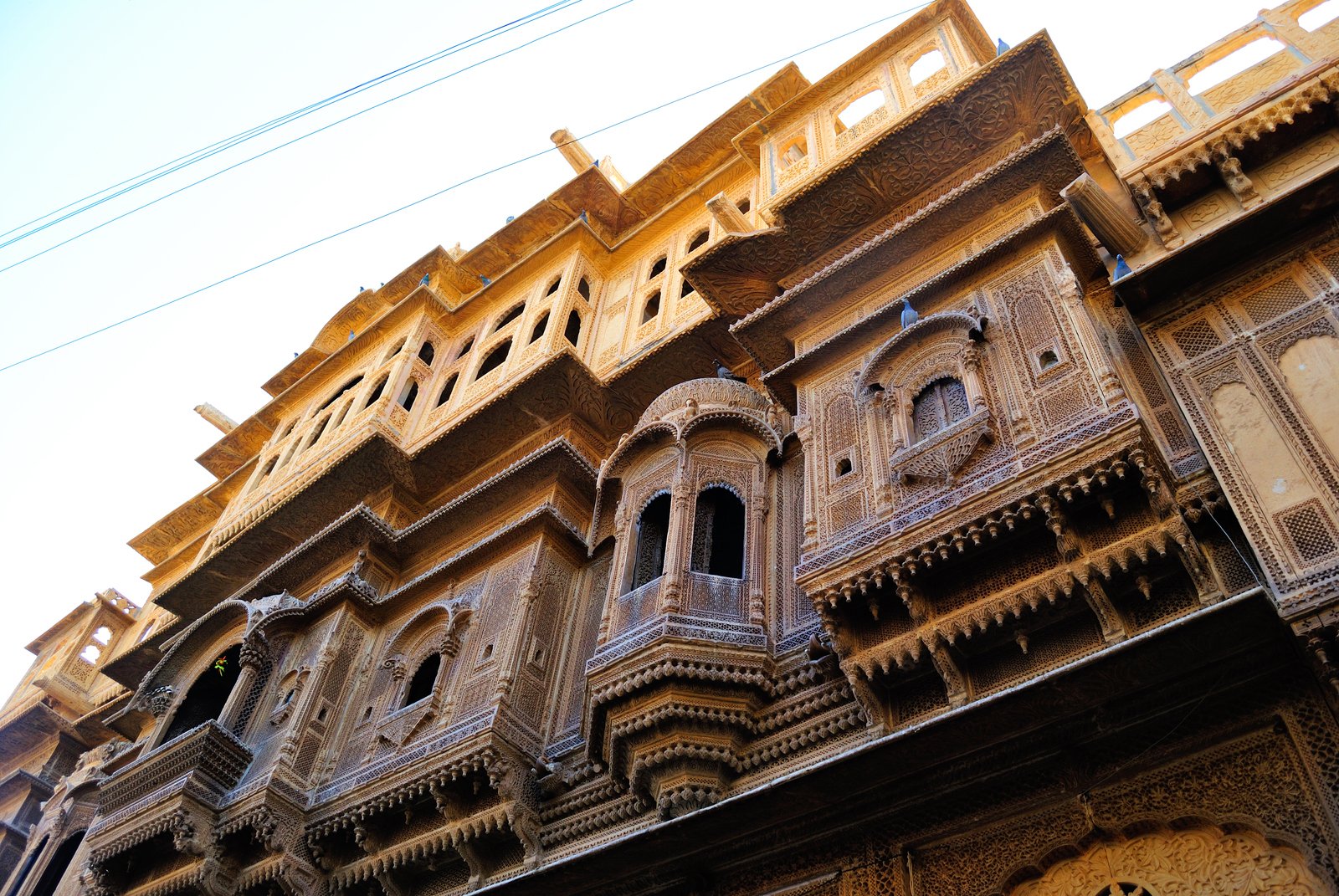 an old building that has been fashioned with intricate carved work