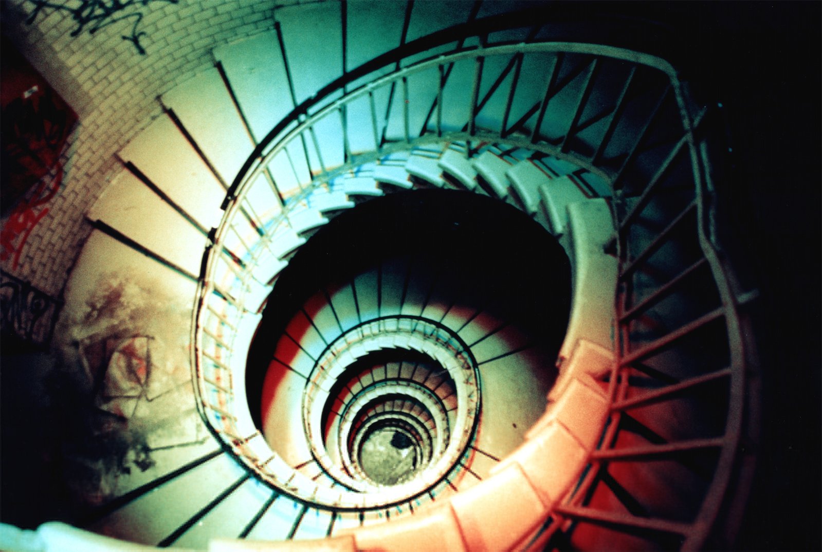 there is a spiral stair staircase in a building