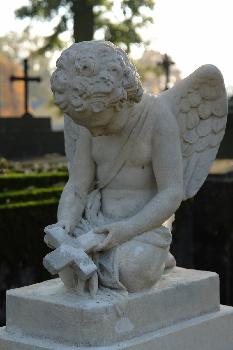 a white marble statue sitting on top of a pedestal