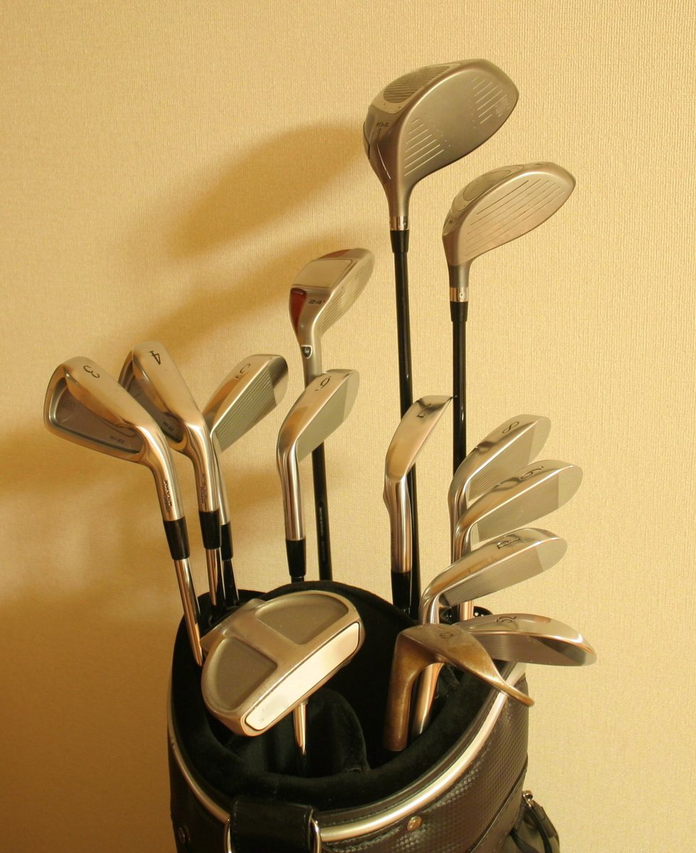 a close up of some golf clubs in a case