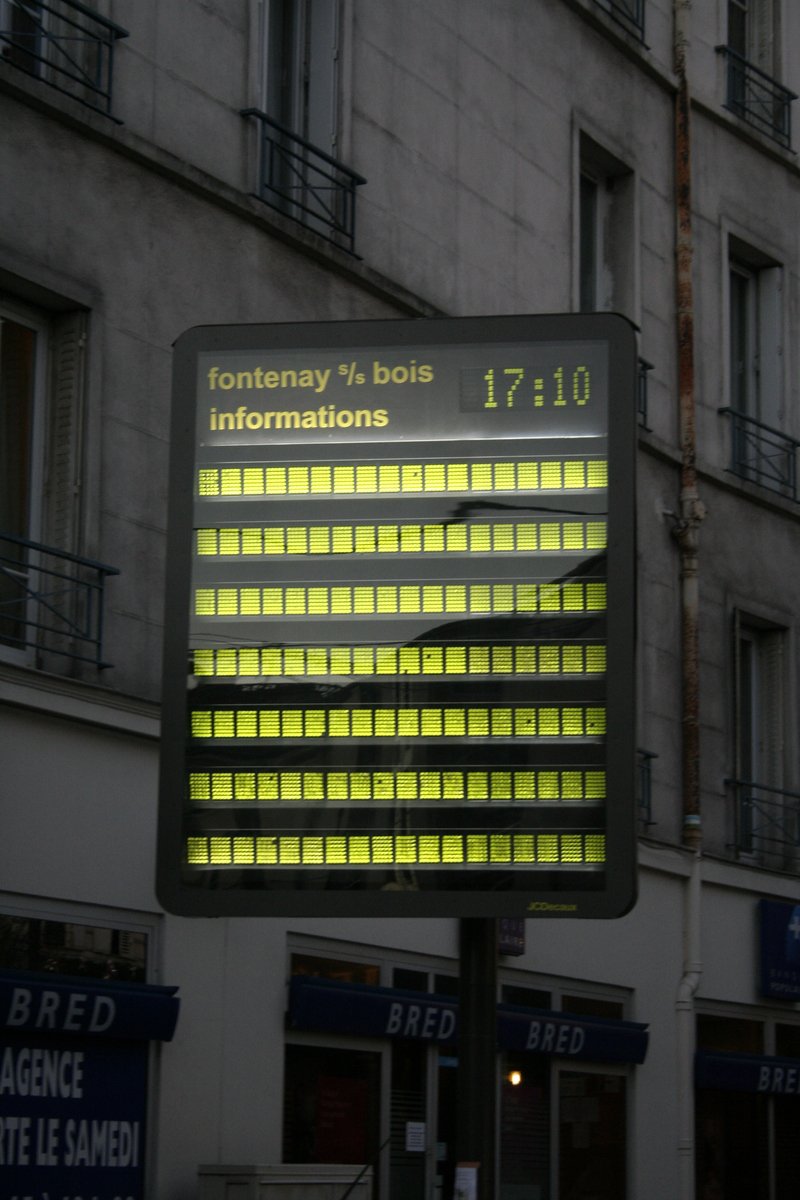 there is a very large information sign in the street
