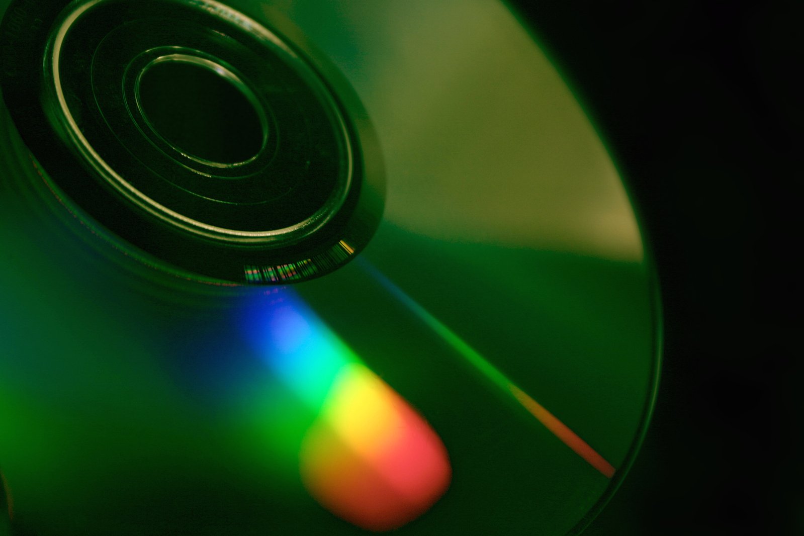 a bright colored disk with a blurry background
