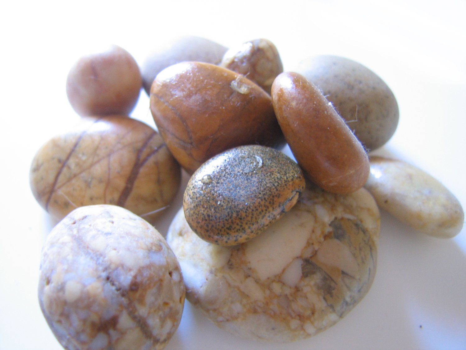 several different stones sitting together on top of each other