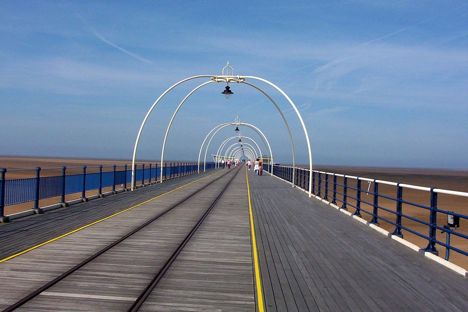 a large walkway with a rail on it