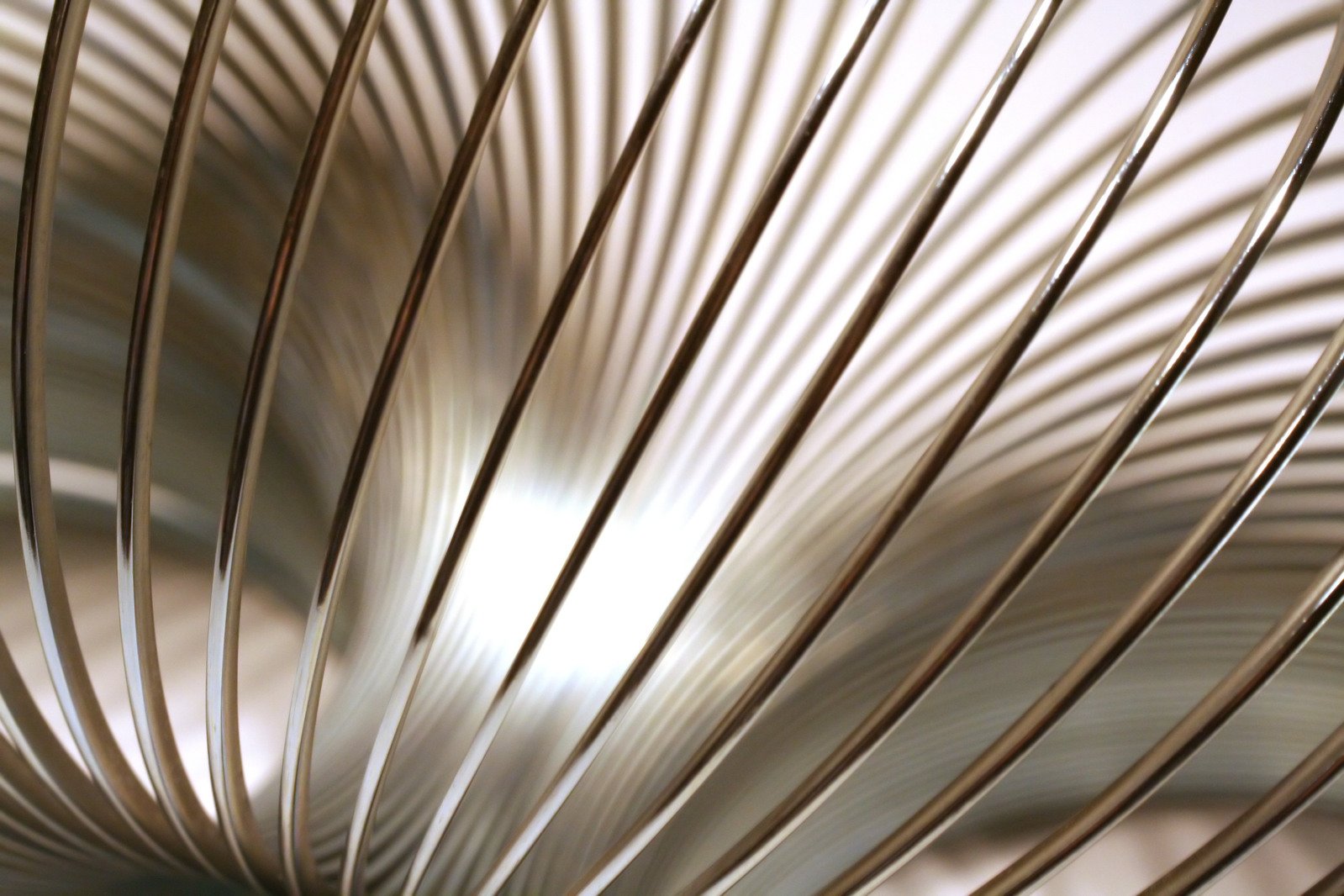 the lines and strips of metal are shaped like fanned things