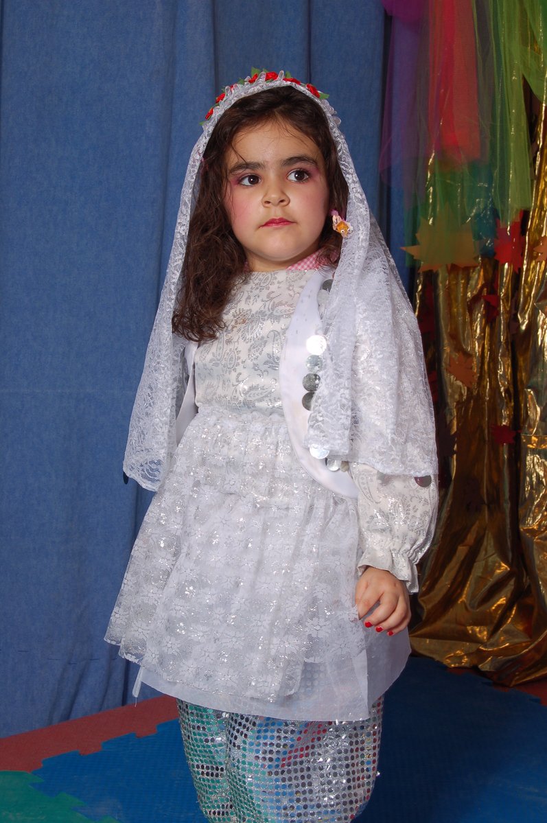 a  poses in a wedding outfit