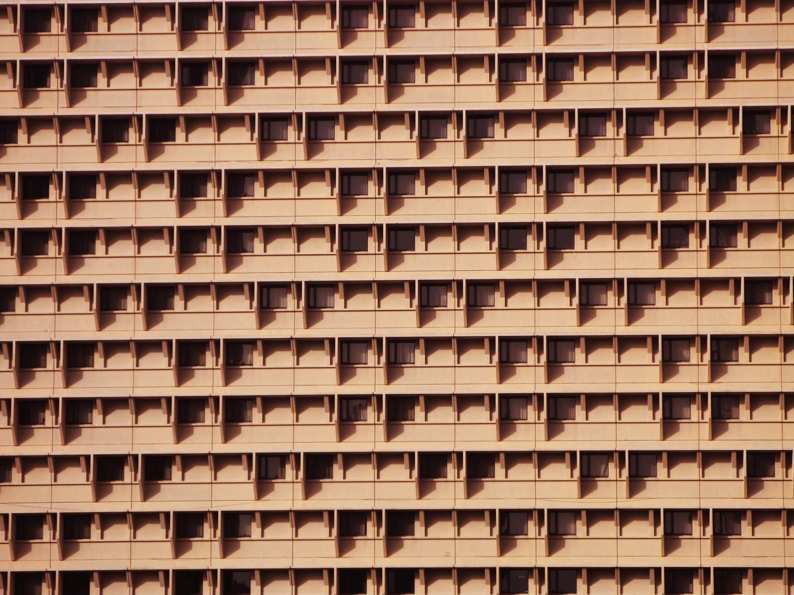 a building with many balconies on the side