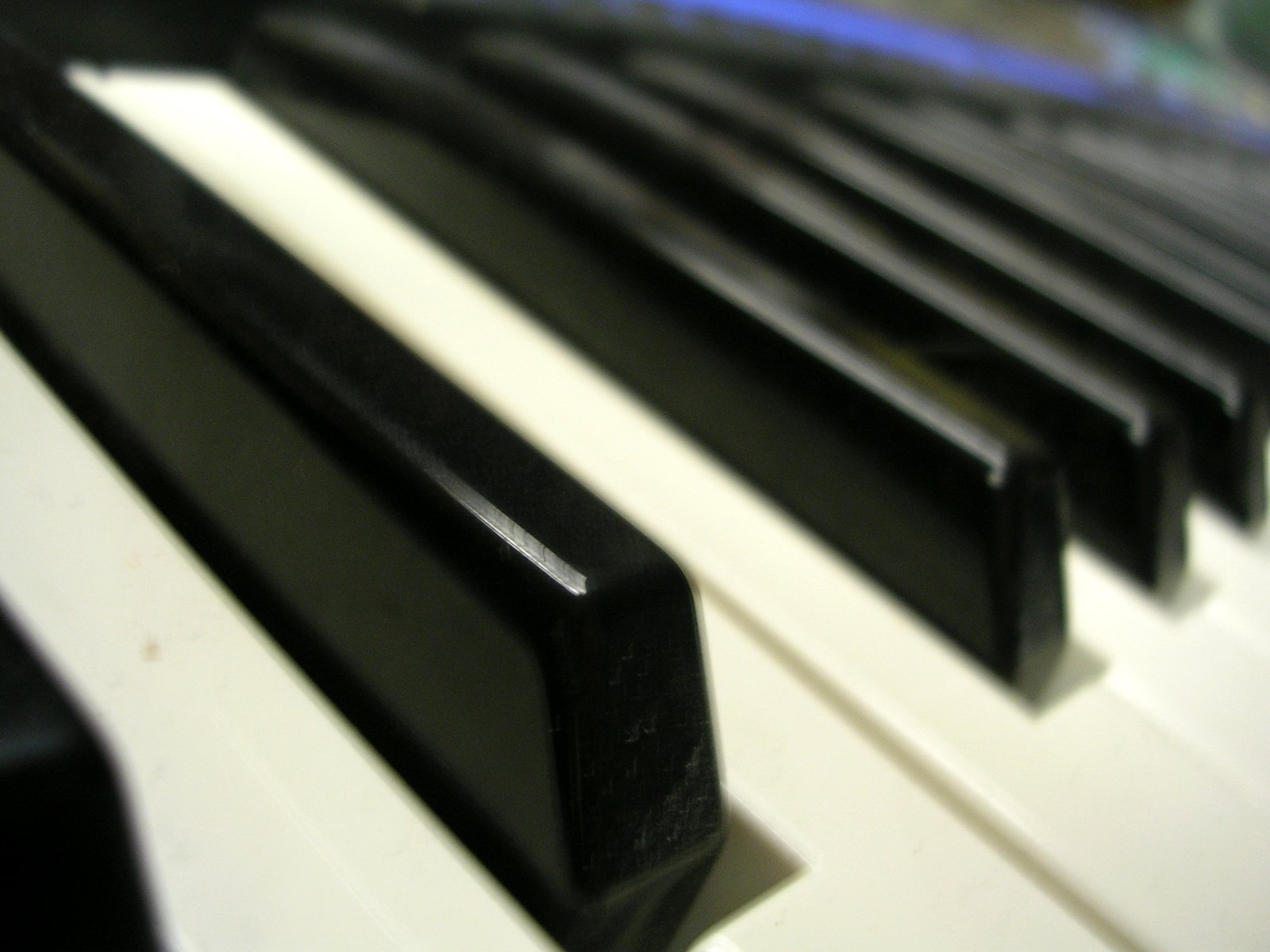 an overhead s of piano keys close up