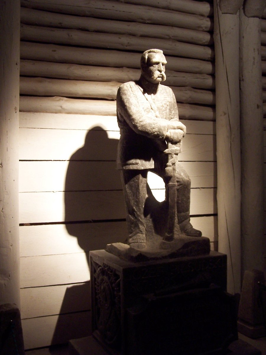 a statue of an athlete is seen in this image
