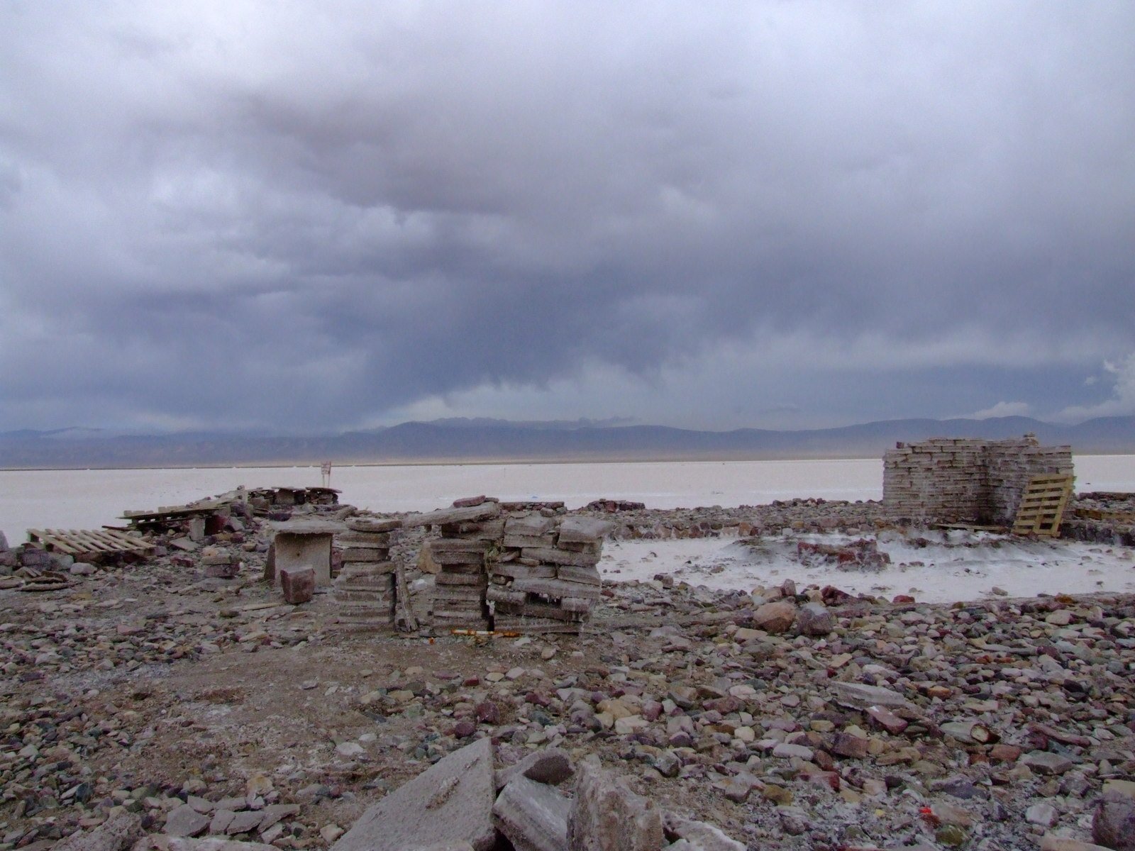 there are a lot of rocks and rubble near the water